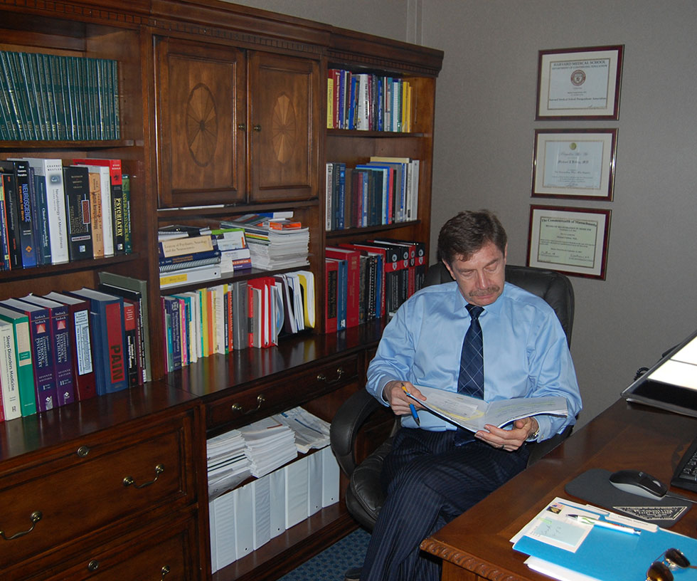 Dr. Kittay at desk