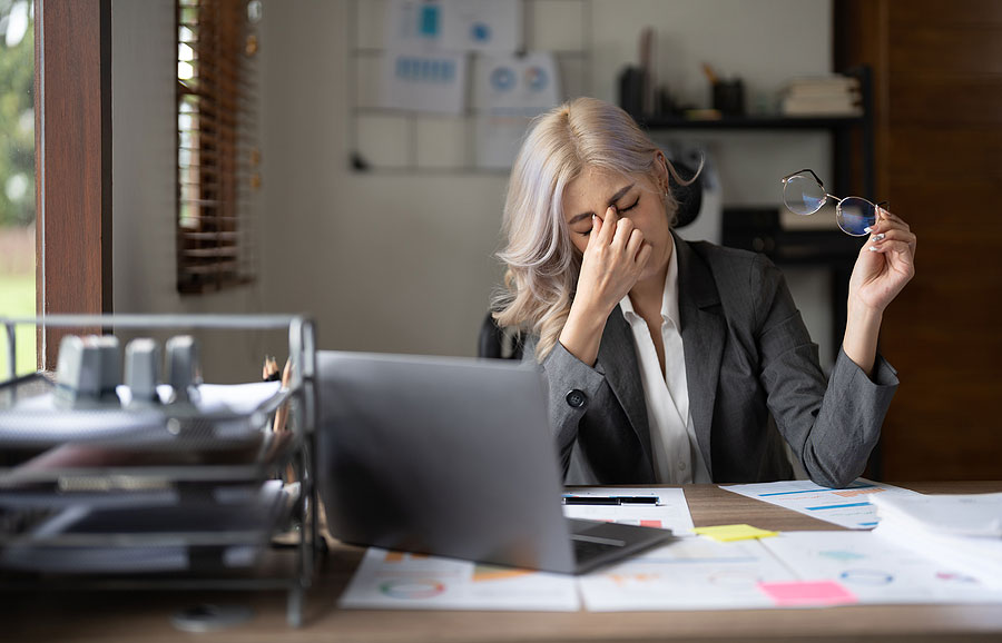 Stressed woman at work