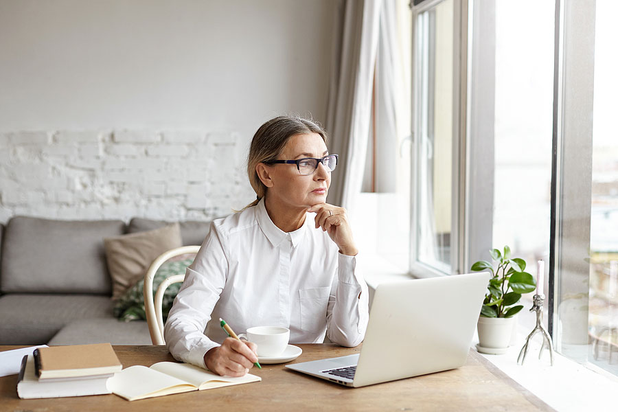 Woman on laptop working from home